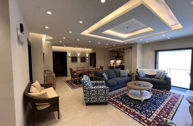 3 bed room apartment with modern kitchen indoor and out door seating area .