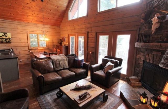 4 season log cottage on Kennisis Lake