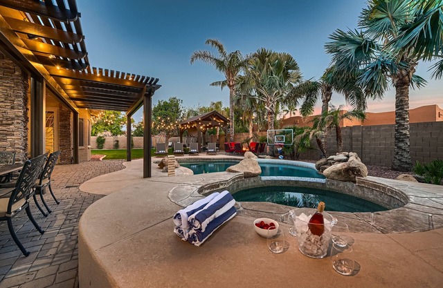 6BR/4.5BA oasis w/heated pool/spa, 3 ensuites, oversized lot, games, fire pits