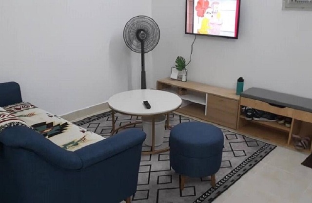 a 58m2 apartment on the 15th floor near the beach