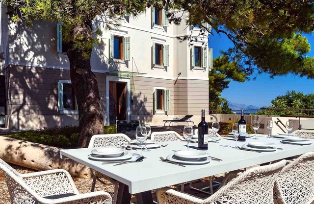 A beachfront villa with a sauna and a gym