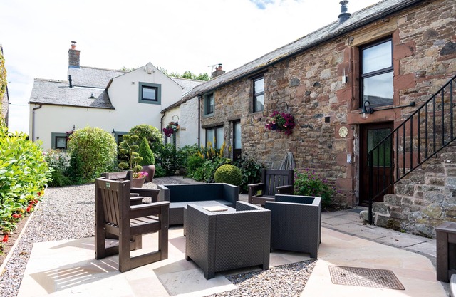 A cottage that sleeps 8 guests in 4 bedrooms