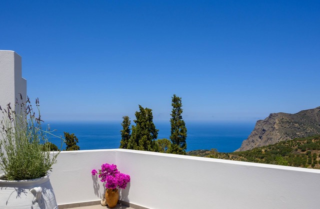 A cozy house with a beautiful view of mountain & sea.