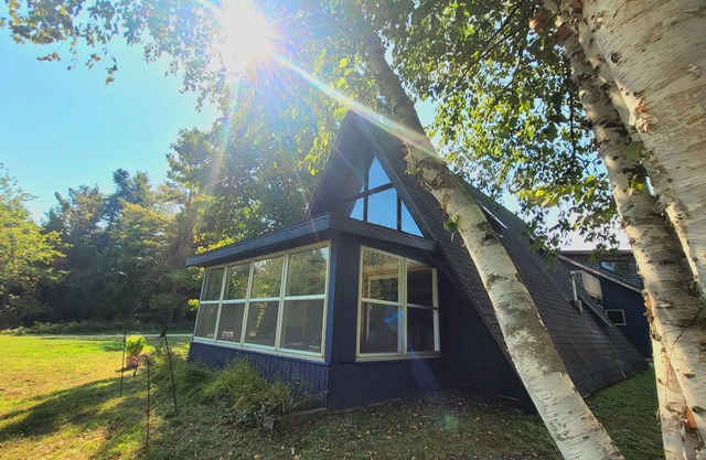 A Frame cabin with a short stroll to a gorgeous sandy beach!