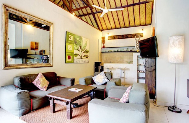 A funky, inviting jewel of a pool villa set in tropical gardens in Seminyak