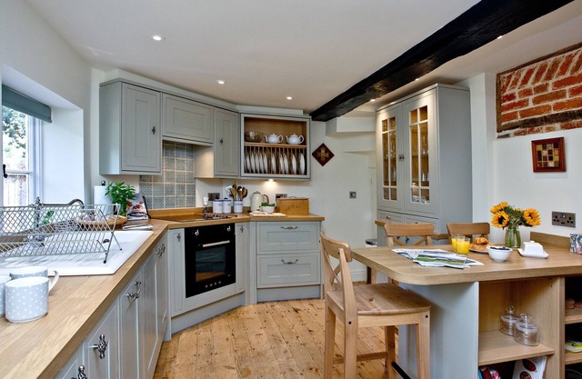 A Grade II listed refurbished house with wood burner and ample parking.