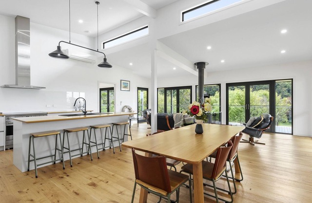 A modern riverside abode close to the beach