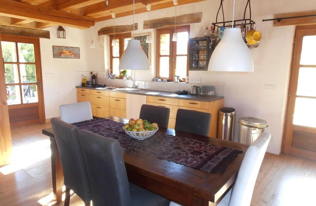 A perigordian house with a beautiful garden and a swimming pool.