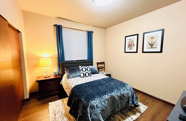 A private bedroom with AC in a quiet neighborhood