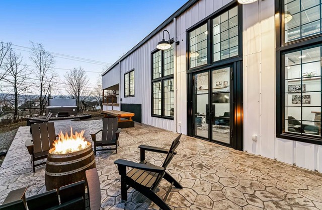 A showpiece, modern, lake-view marvel w/Hot Tub, Chef's Kitchen