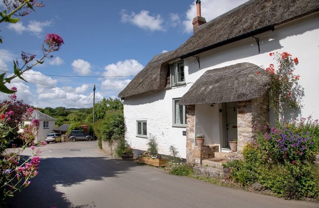 A stunning, one bedroomed, beamed thatched cottage in the village of Stockland.