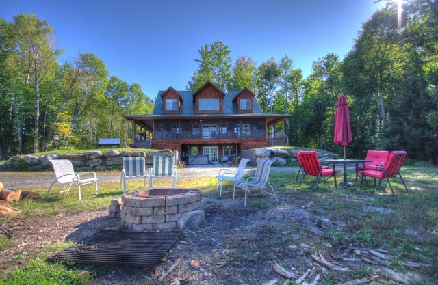 adirondack style all season lodge/resort on a natural glacier pond