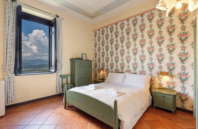 Agriturismo 'Quadruple Room With View of Vesuvius' with Mountain View, Shared Pool and Wi-Fi