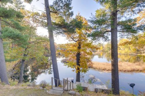 Antiquing and Fishing Riverfront Waupaca Home!