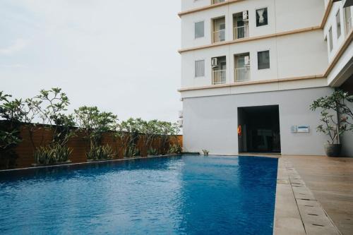 Apartemen Mahogany oleh Halahouse