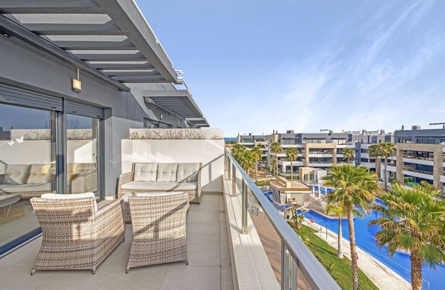 Apartment 'Flamenca Village' with Shared Pool, Wi-Fi and Air Conditioning