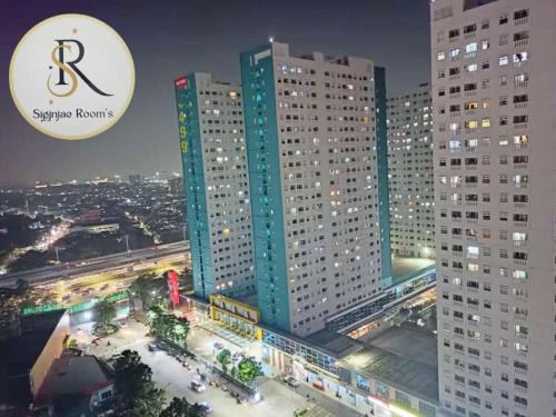 Apartment Green Pramuka City 2 Bedroom by Siginjae Rooms