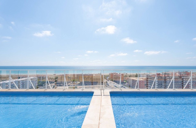 Apartment 'Lopimar playa Canet' with Shared Pool, Wi-Fi and Air Conditioning
