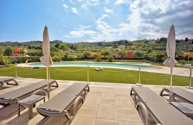 Apartment 'Monolocale Rebi' with Shared Pool, Garden and Wi-Fi