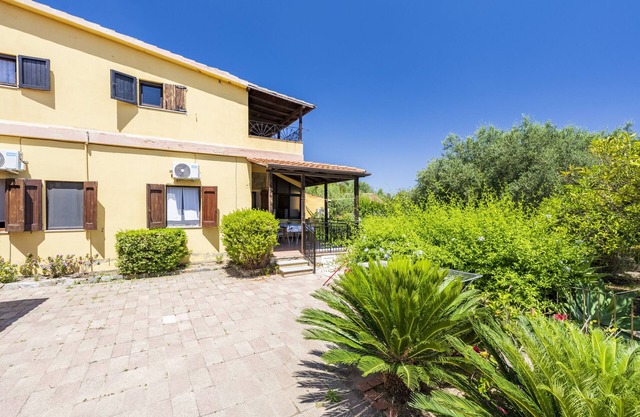 Attractive Holiday Apartment "Casa Chicco" with Ventilators, Terrace & Sea View