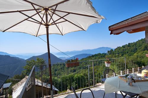 Baita Gabriele con Terrazzo e Vista Lago per 4 Persone