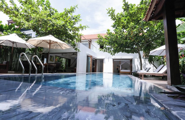 Banyan Ocean Villa is a large peaceful home just steps from the stunning Beach