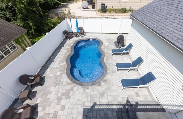 Bay Block with in-ground heated Salt Water Pool open through October 31, 2026
