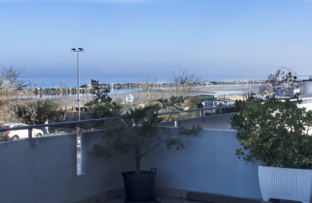 Beachfront apartment in Rimini with panoramic terrace "Francesca"
