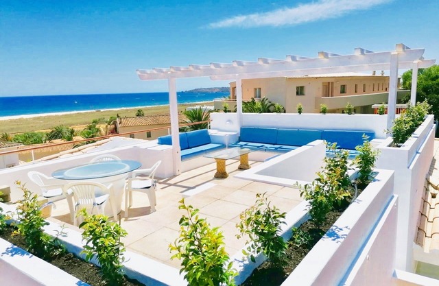 Beachfront Apartment with Private Roof Terrace, BBQ, and Sea views