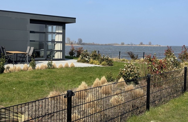 Beachfront Enkhuizer Strand Chalet with Fenced Yard and Exceptional Lake View