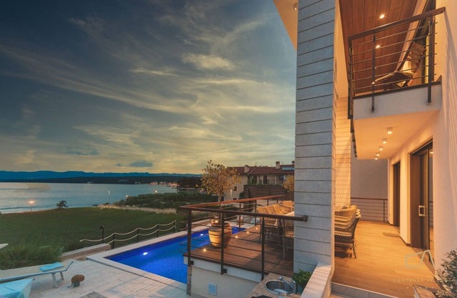 Beachfront Villa Marconica* with a sea view and a pool on Krk