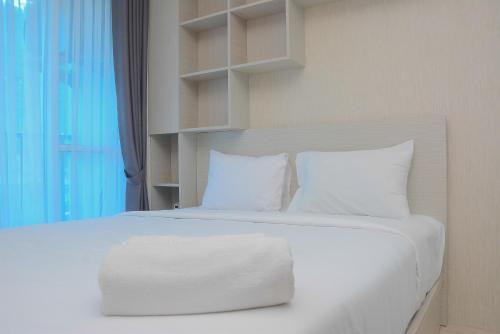 Beautiful and Relaxing Studio Tifolia Apartment By Travelio