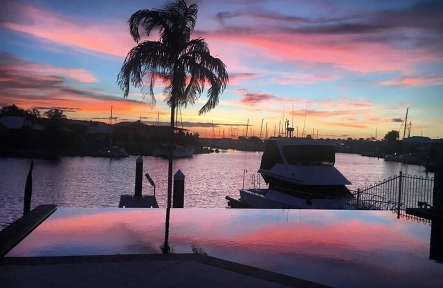 Beautiful spacious waterfront home right on the Cullen Bay Marina!