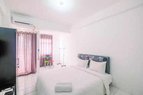 Beautiful Studio at Gunung Putri Square Apartment By Travelio