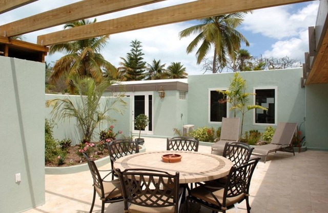 Beautifully renovated 3 BR/4 BA condo footsteps from the beach