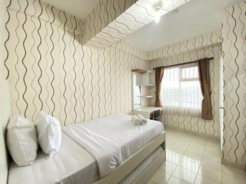 Best Price Studio Apartment at Easton Park Residence Jatinangor By Travelio