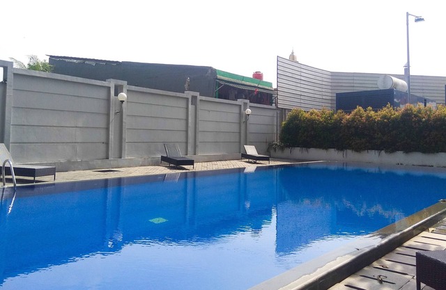 Best Studio Room with Wall Bed Tifolia Apartment