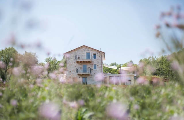 Breath in the true Istrian feel in this romantic, new, stone villa with pool.