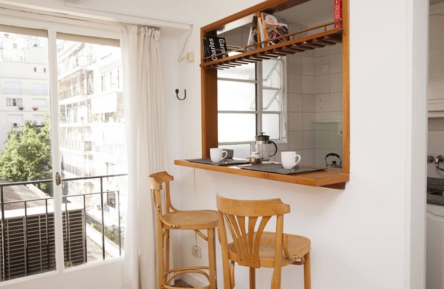 Bright 1 BR apartment with full kitchen, dining, living area with full bathroom.