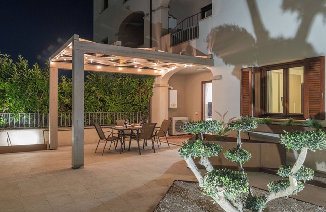 Bright one-bedroom apartment with large garden a few steps from the Olbia waterfront
