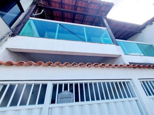 Casa Aconchegante com Varanda e 2 Quartos