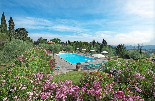 Casa Canarino E: A welcoming apartment surrounded by the greenery.