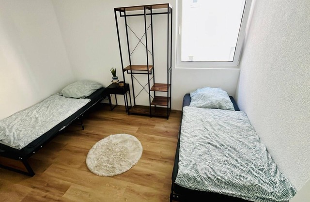 Central 1-room apartment kitchen, washing machine, parking space, flexible sleeping area