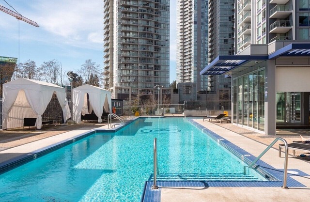 Centrally located, 30 plus floor Rocky Mountains view 1 BR Condo