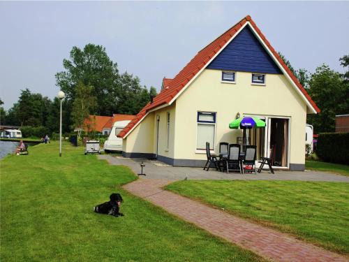 Chalet in Bergumermeer by the Canal