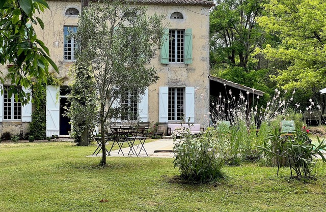 Character house located in lush greenery
