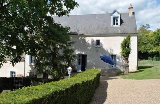 Charming 3-Level Cottage in Restored Mill with Private Garden, Fireplace, and Games Room in Bléré