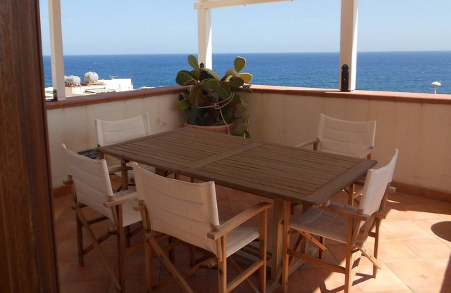 Charming airplane house by the sea with terrace
