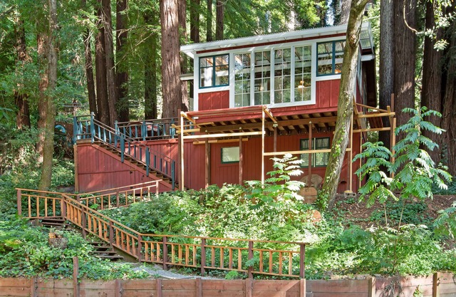 Charming & colorful cabin with a furnished deck & forest views - dog-friendly