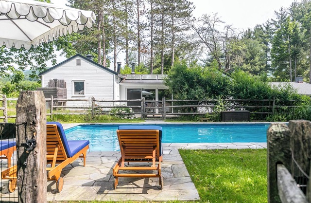 Chic two Cottage compound with pool and hot tub in a pastoral Woodstock setting.